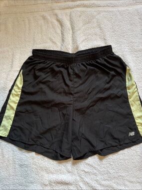 New Balance Black Athletic Shorts with Light Green Side Stripes